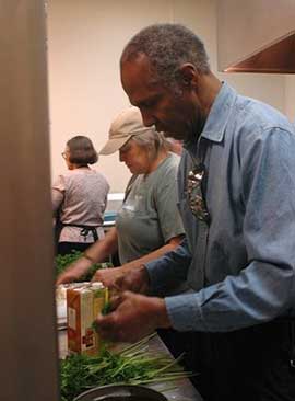 Volunteers making healthy lunches through the Brown Bags Project