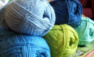 yarn skeins in blues and greens