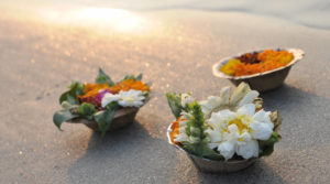 offerings of flowers on ganga