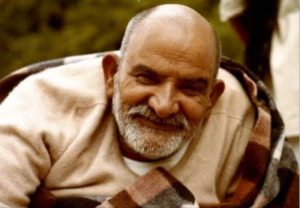 Smiling Neem Karoli Baba